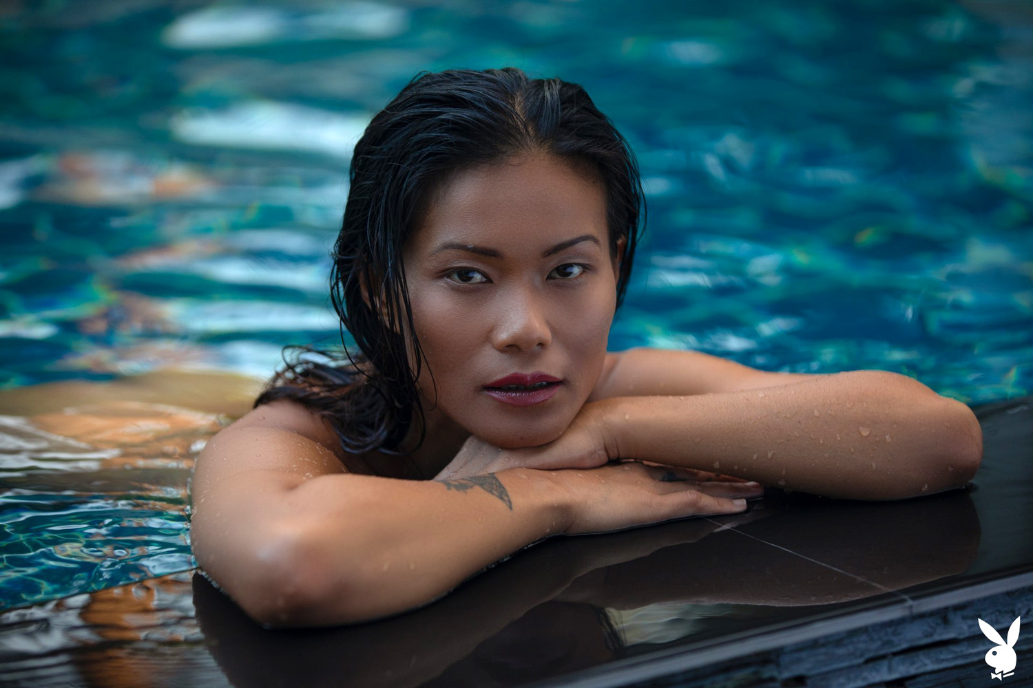 Maki Katana undresses to swim naked in the large pool